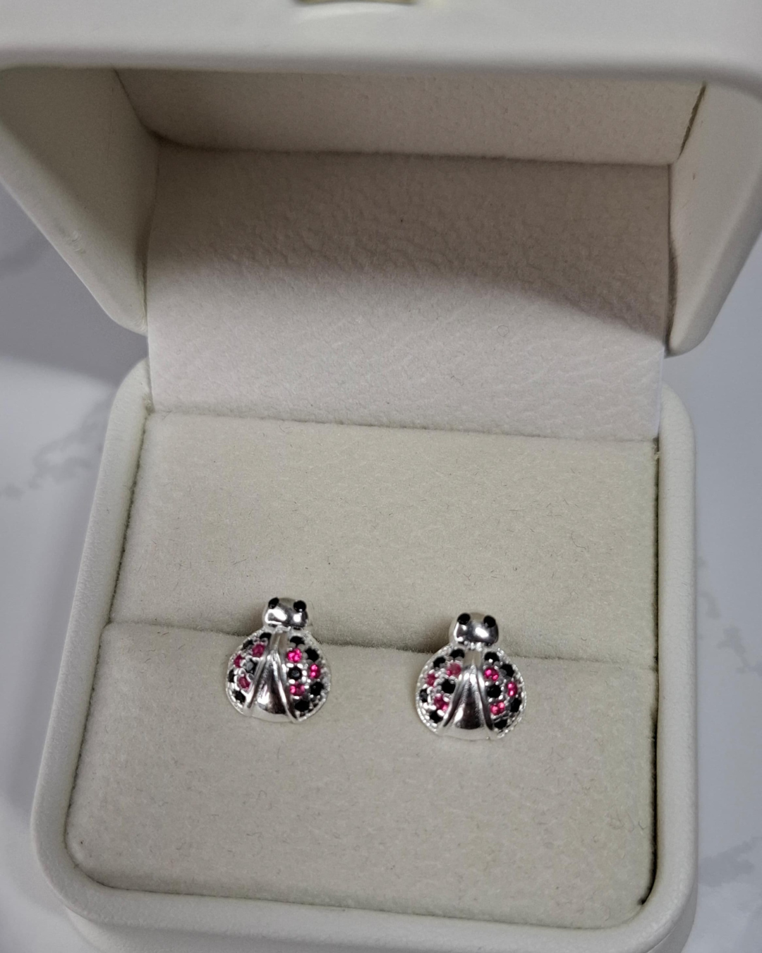 Topos mariquita de plata