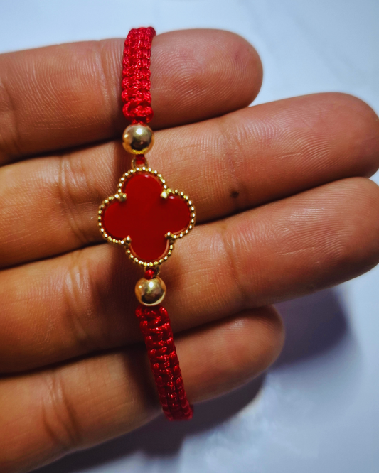 Pulsera tejida 0.27 gr oro 18k y herraje en rodio trébol