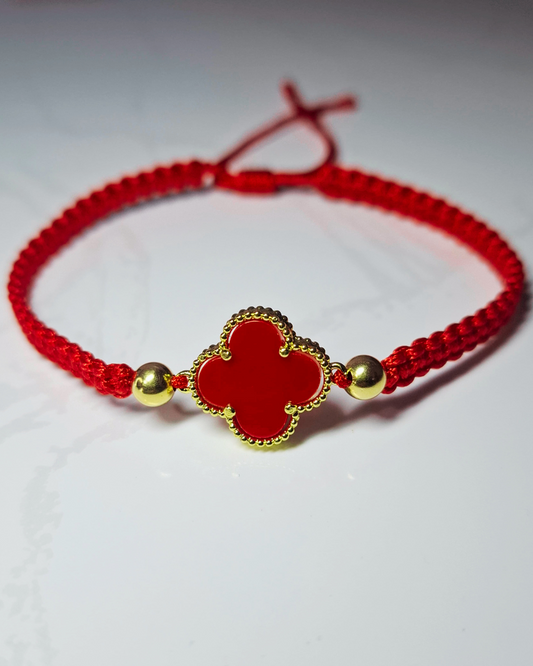 Pulsera tejida 0.27 gr oro 18k y herraje en rodio trébol