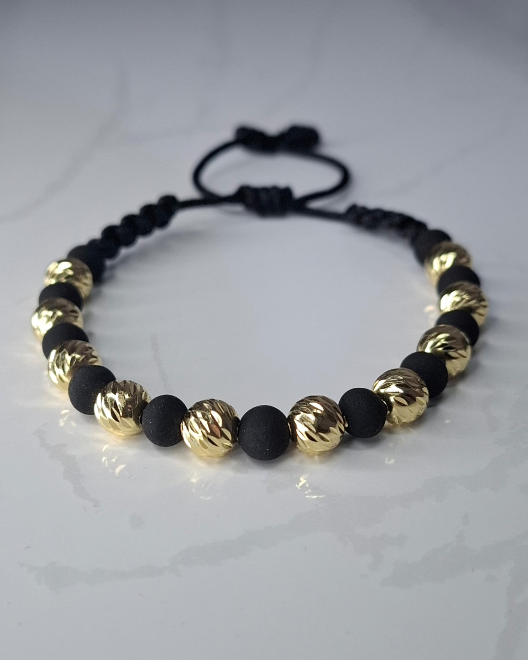 Pulsera tejida 2.93 gr  oro 18k, 10 balines # 7 diamantados